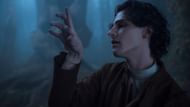 Isaac taunts the Addams family (Image via Netflix)